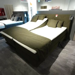 Boxspringbett Atlanta 0514238 Stoff 9153 Grün Kopfteil 3 Steppung Kachel Füße Schwarz Mit Fernbedienung Und Matratze