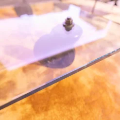 Couchtisch Tavola con Ruota Grande, Design Gea Aulenti 1980, geschliffenes Glas 15 mm, Gestell Rollen schwarz