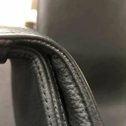 FK Schalensessel Leder 65 Schwarz Kreuzfuß Aluminium