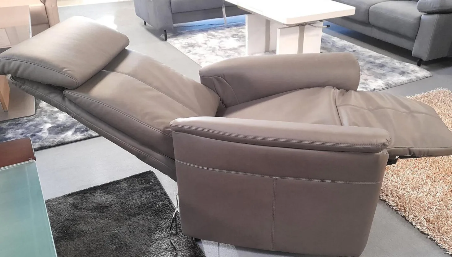 Relaxsessel 50025 Stoff Frisco Kiesel Grau Fuß Rollen