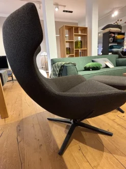 Sessel Caruzzo Plus Stoff Apollo Dunkelgrau Braun Drehgestell Schwarz Lackiert Inklusive Hocker